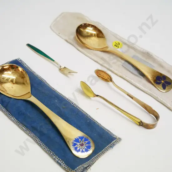 Norwegian gold-plated sterling silver & enamel items - 1976 & 1977 collector spoons, sugar tongs, small pickle fork