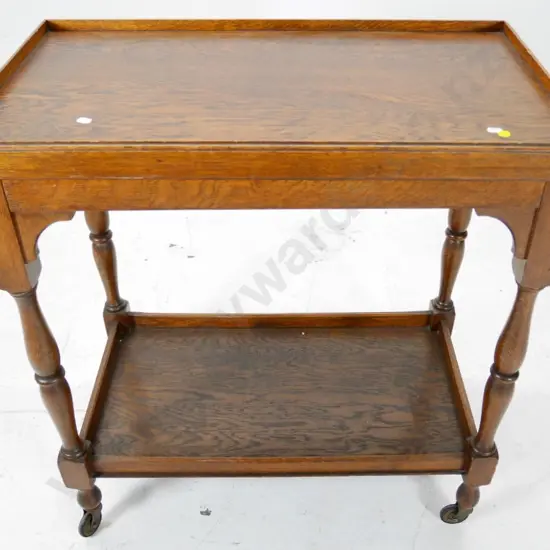 oak tea trolley with lift-off tray and lower shelf, original casters H775 L730 W420