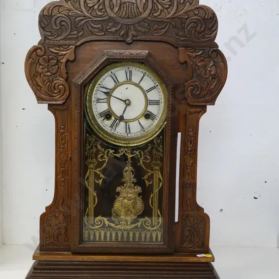 Ansonia wood-cased mantel clock with key, press-carved front, gilt glass decoration - from Evans Flat Hotel H-610 W-380
