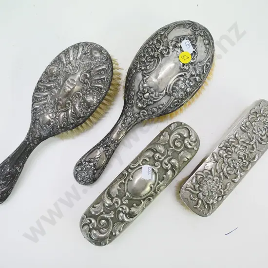 2 sets of figured (plated?) silver hair & clothes brushes, no marks