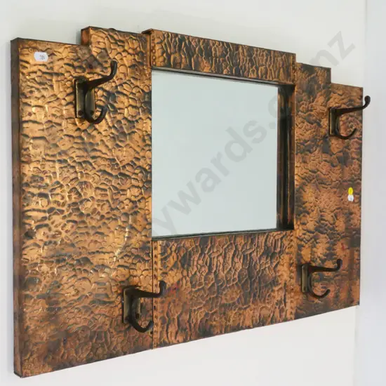 deco beaten copper framed wall mirror with 4 coat hooks - label on back: Made by A.T. Hart, Dunedin H-445 W-675