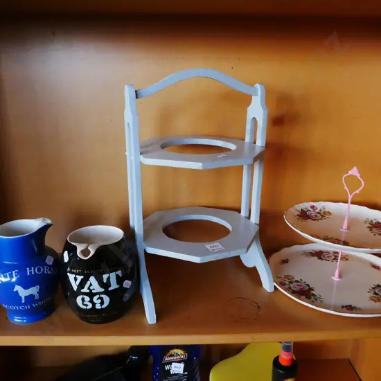 2x whisky jugs, plate stand, cake stand
