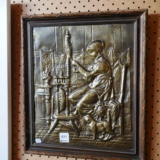 pressed brass wall plaque - at spinning wheel