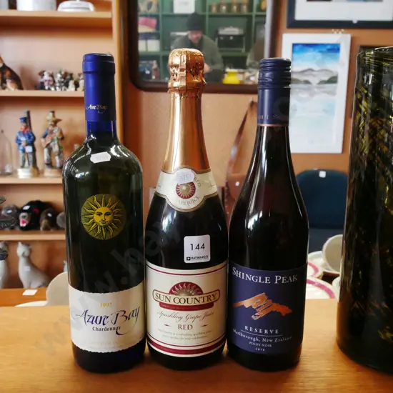 bottle of Chardonnay, Pinot Noir, sparkling grape juice