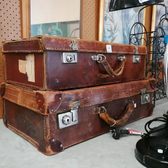 pair of bullock hide suitcases