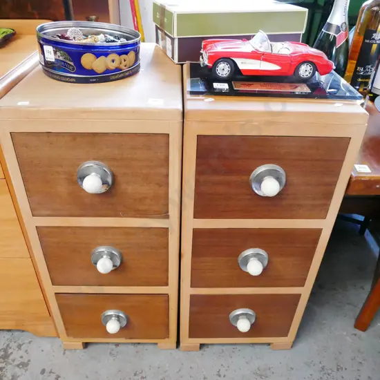pair of bedside cabinets