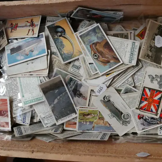 wooden crate of cigarette cards