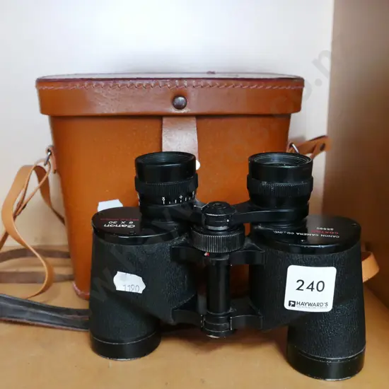 pair of 8x30 leather cased binoculars