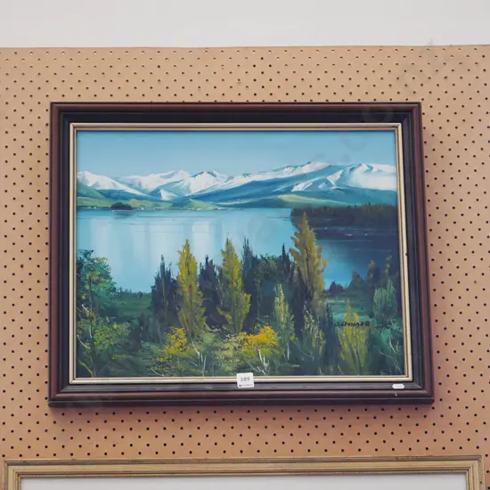 framed oil - lake and mountain scene