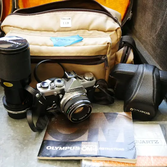 Olympus 35mm camera with bag, additional lens