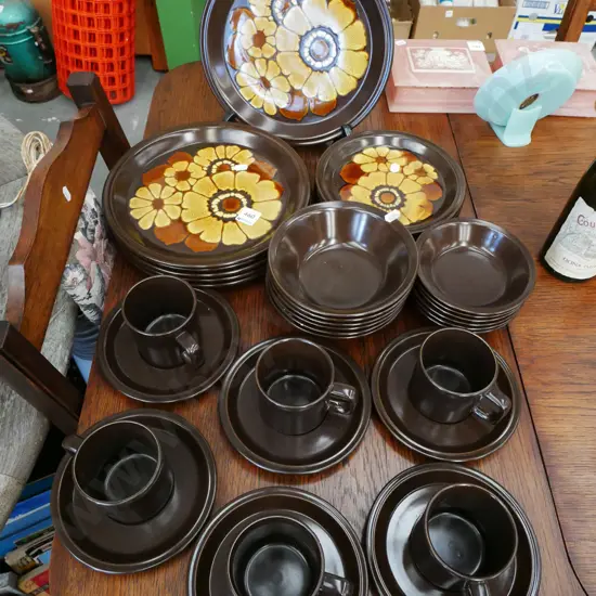 assorted retro floral plates, bowls, cups, saucers