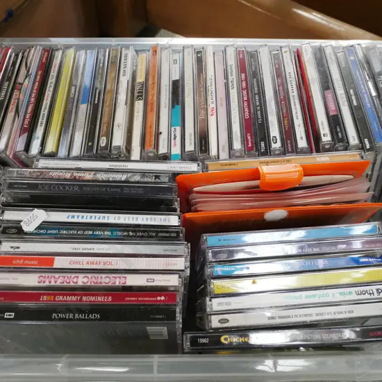 plastic tub of CDs
