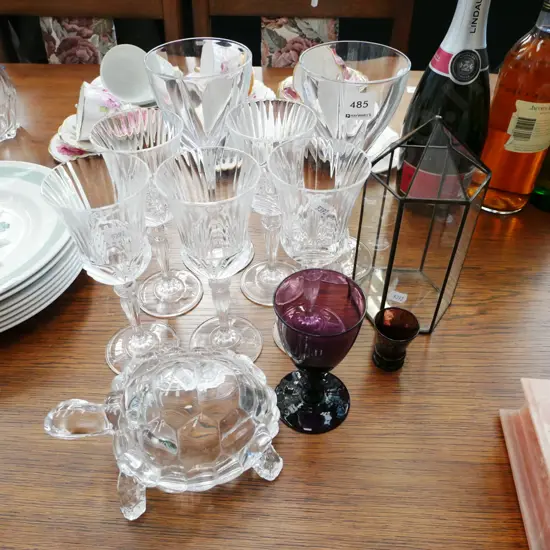 wine glasses, tea candle lantern,  glass turtle