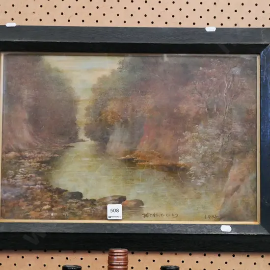 oak framed painting of a stream