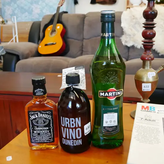 Martini, hip flask of Jack Daniels, small bottle of wine