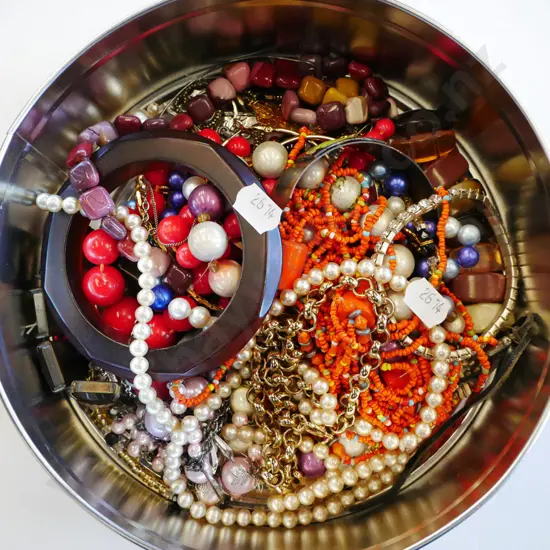 tin of costume jewellery