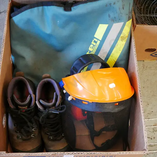 box; chainsaw chaps, boots, visor