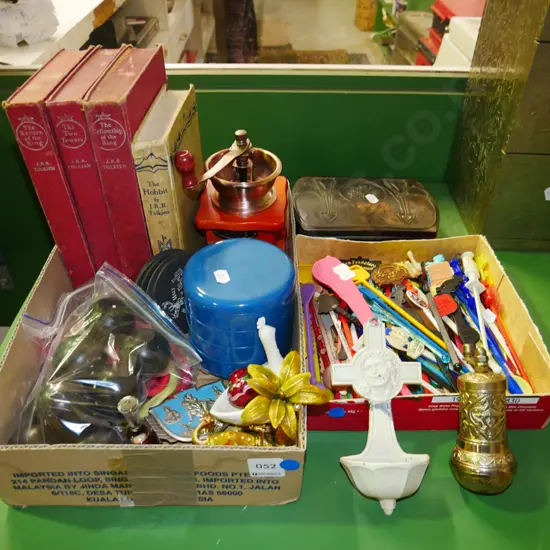 box of swizzle sticks, box of Tolkien books, storage canisters etc - blue dots