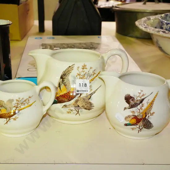 3x graduated pheasant jug Largest has internal staining