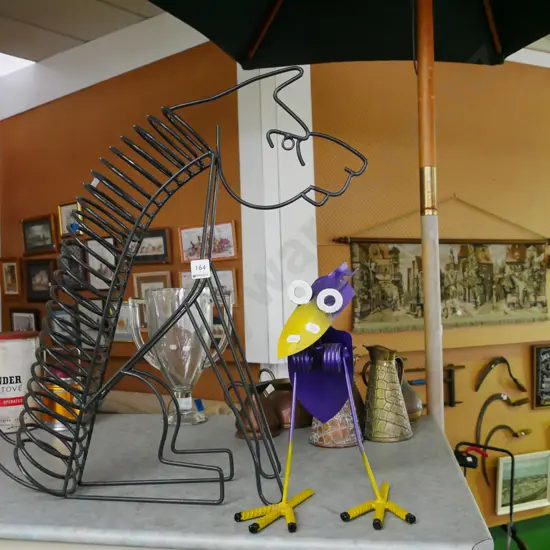 wrought metal dog themed CD rack and metal bird themed garden ornament