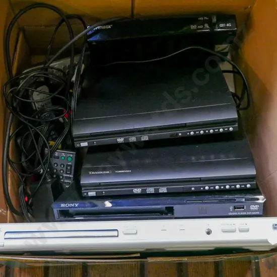 box; DVD players, remotes etc