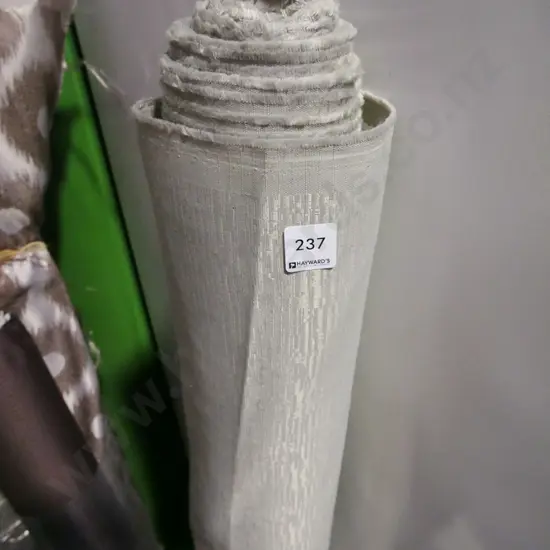 bolt of grey upholstery fabric