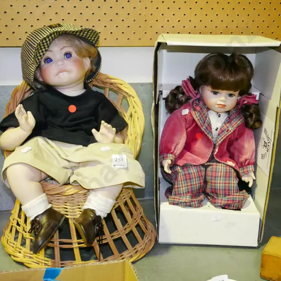 1x boxed Hillview Lane porcelain girl doll, 1x porcelain boy doll in chair -red dots