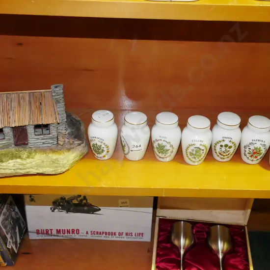 small stone cottage, various ceramic herb canisters