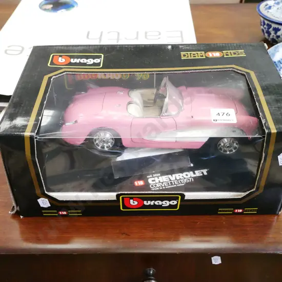 die cast Burago 1:18 scale model of model pink 1957 Corvette
