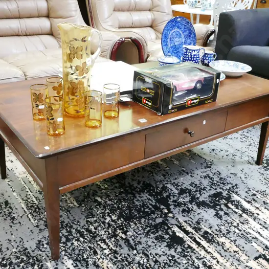 dark stained solid wood coffee table with single drawer H-460 W-1300 D-700