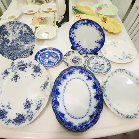 assorted blue and white ashets, plates