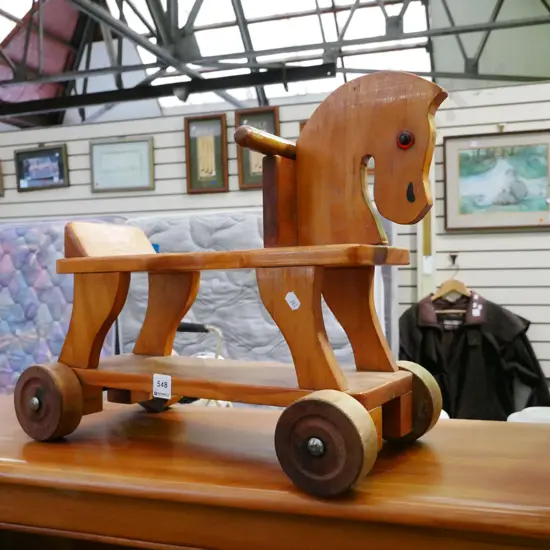 small child's ride along horse