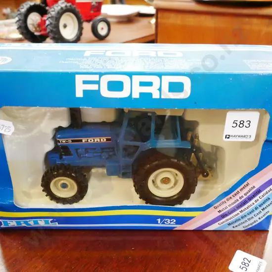 die cast 1:32 scale model of a Ford TW-5 tractor
