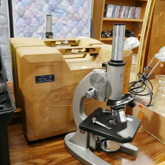 Olympus microscope in plastic case