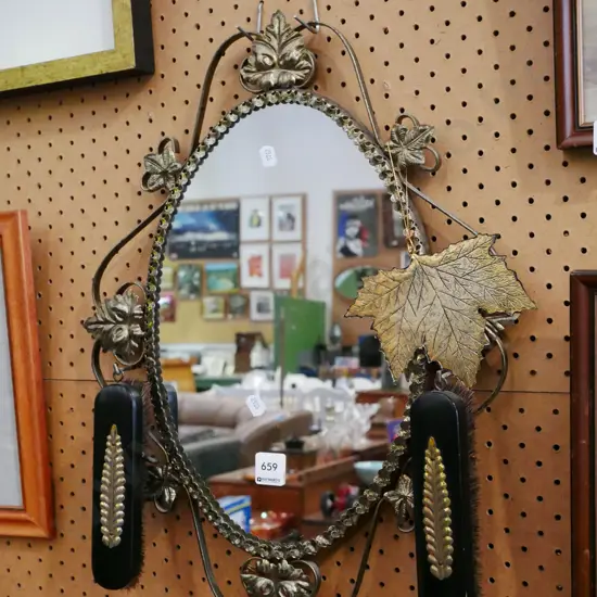 retro wrought metal wall mirror with 2 clothes brushes