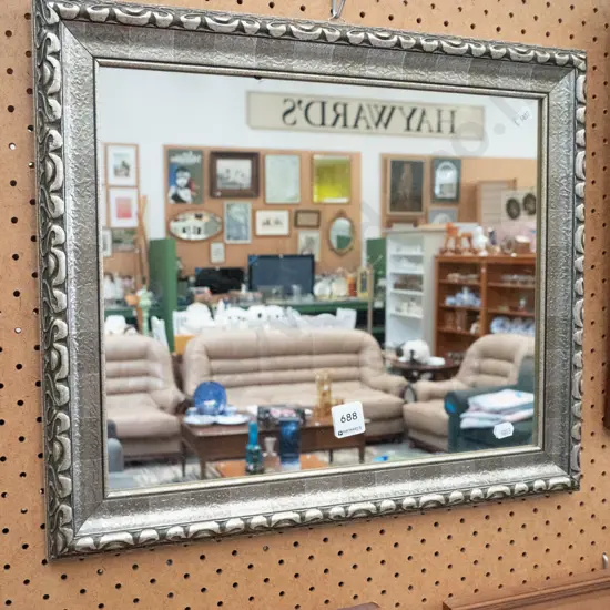 small silver framed wall mirror