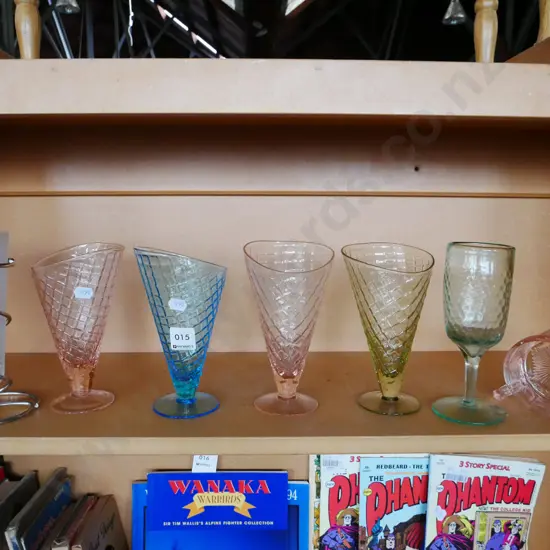 shelf of glassware - parfait glasses, vases etc