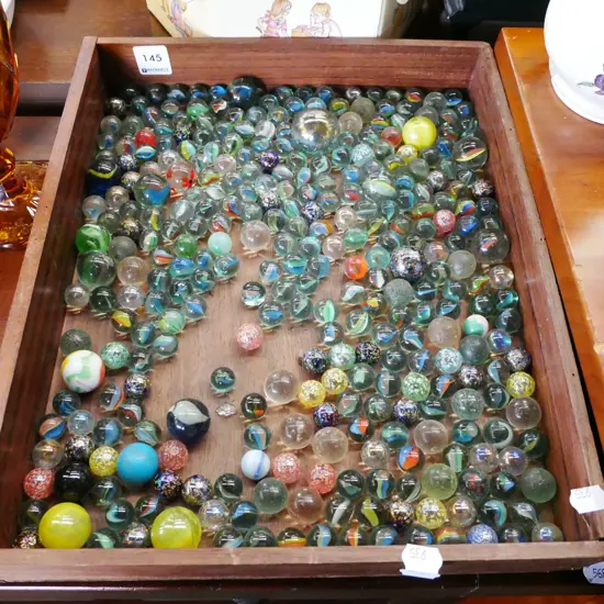 wooden tray; marbles