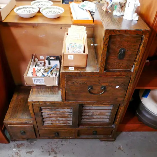 Indonesian hardwood step bookcase with 2 sliding doors and 5 drawers H-920 W-780 D-350