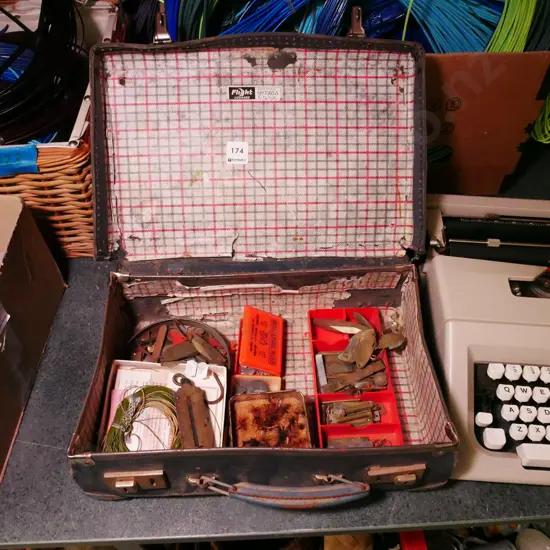 vintage suitcase, fishing flies and lures