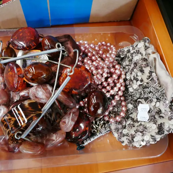 plastic tray, necklaces, hair clips, bangles etc