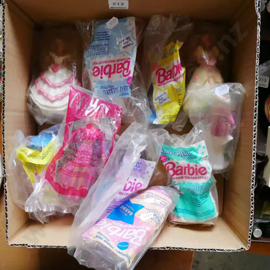 box; assorted Barbie Happy Meal figurines