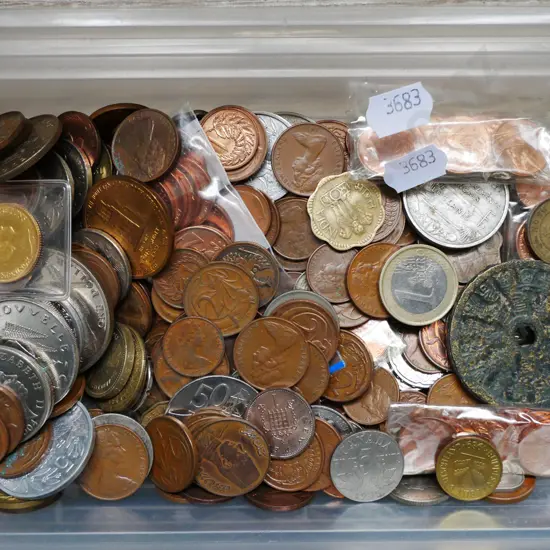 plastic tray of coins
