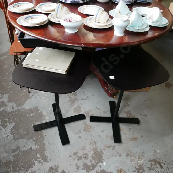 2x dark stained metal based pedestal wine tables