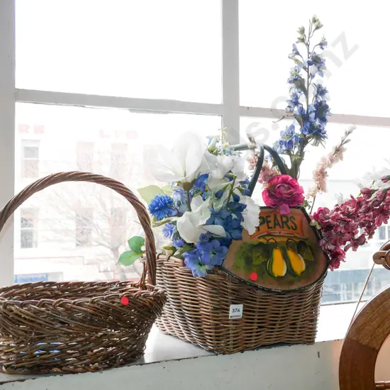 2x cane baskets, 1 has faux flowers and pierced picture