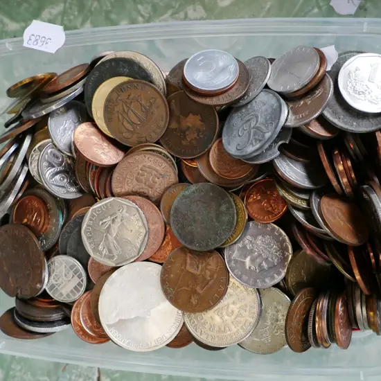 plastic container of coins