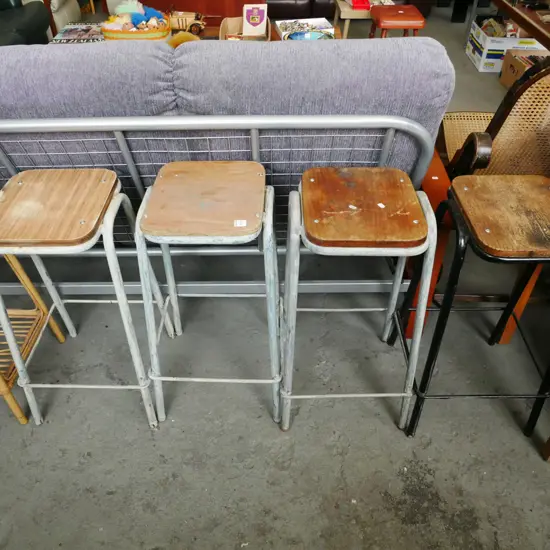 4x metal based wood topped stools