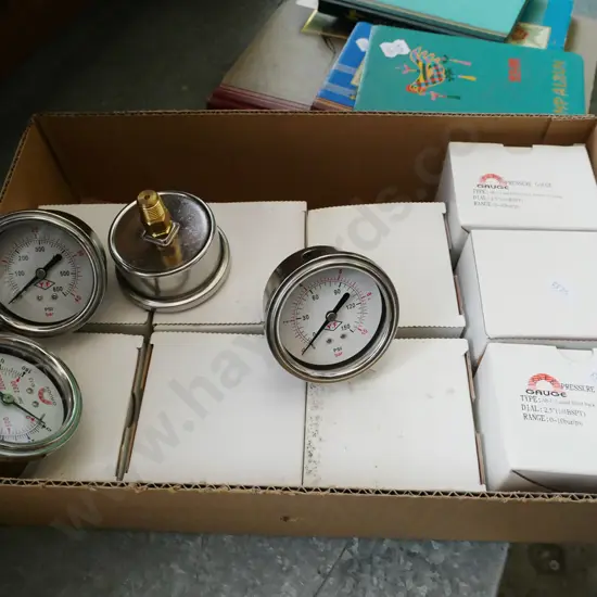 box of as-new pressure gauges