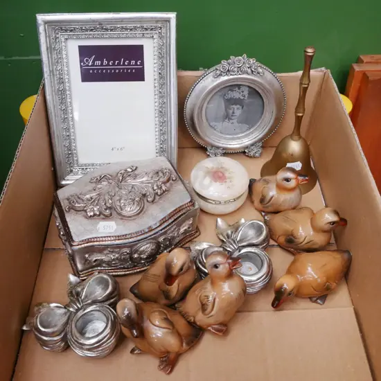 box; duck figurines, candlesticks, brass bell etc