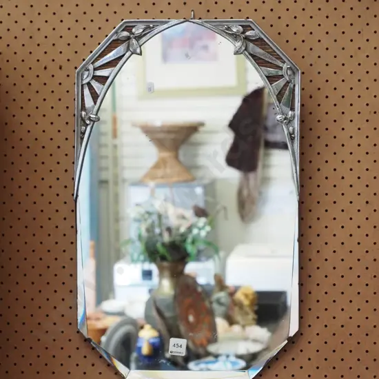 art deco wall mirror with chrome sunburst design and leaves